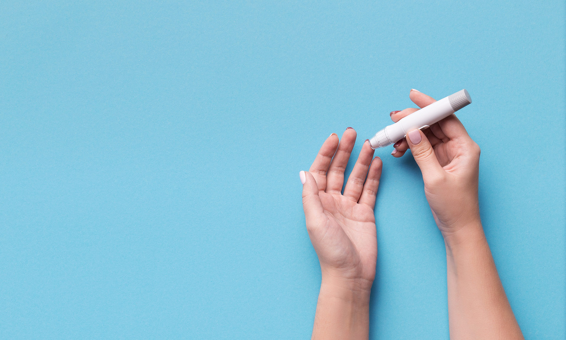 Woman using glucometer